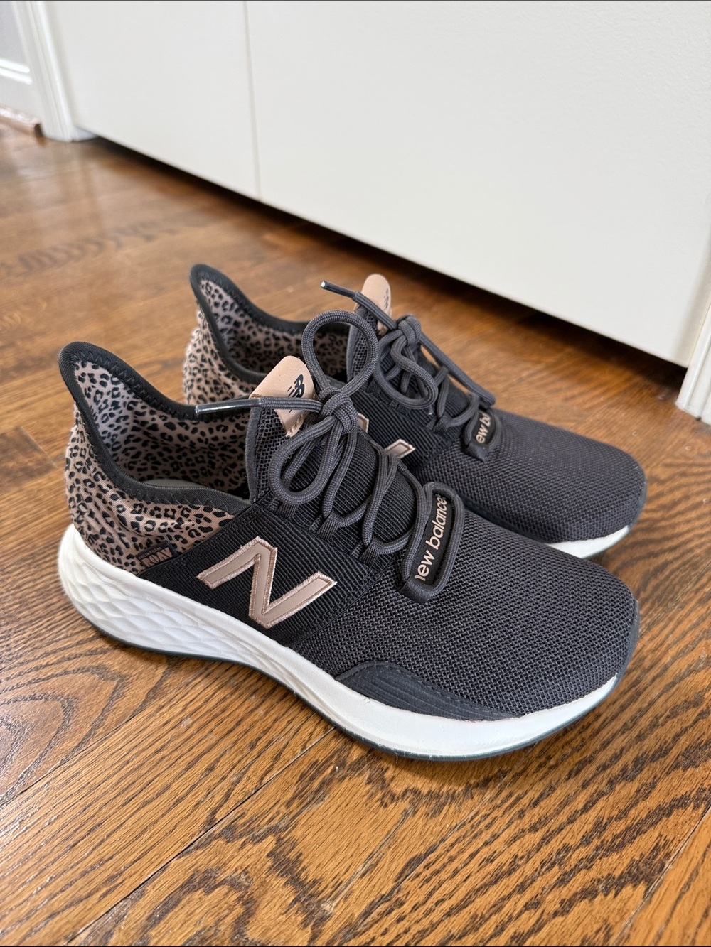 New Balance Women's Black and Rose Gold Sneakers with Leopard Accent